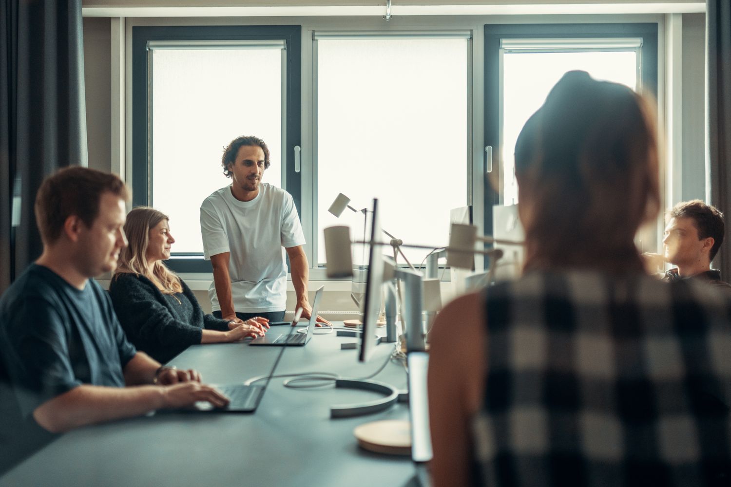A people operations team reviewing onboarding plans